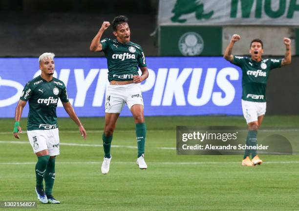 Gustavo Scarpa of Palmeiras celebrates with his team mates after scoring the first goal of their team during a match between Palmeiras and Fortaleza...