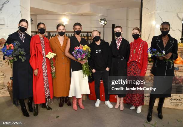 Designer Jason Wu poses with models backstage at the Jason Wu Runway during New York Fashion Week: The Shows on February 14, 2021 in New York City.