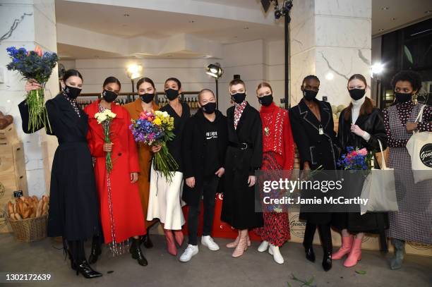 Designer Jason Wu poses with models backstage at the Jason Wu Runway during New York Fashion Week: The Shows on February 14, 2021 in New York City.