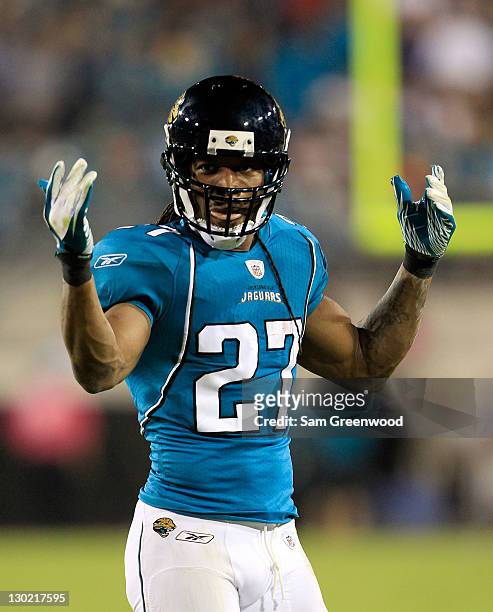 Rashean Mathis of the Jacksonville Jaguars asks the crowd for noise during the game against the Baltimore Ravens at EverBank Field on October 24,...