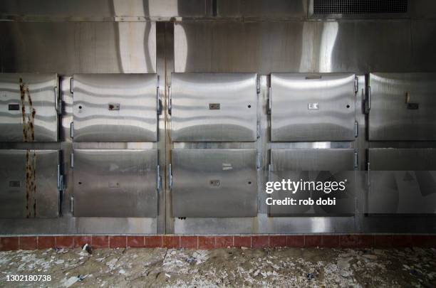 morgue drawers inside abandoned mental asylum - morgue imagens e fotografias de stock