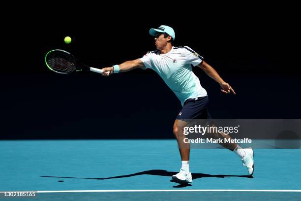 Mackenzie McDonald of the United States plays a forehand in his Men's Singles fourth round match against Daniil Medvedev of Russia during day eight...