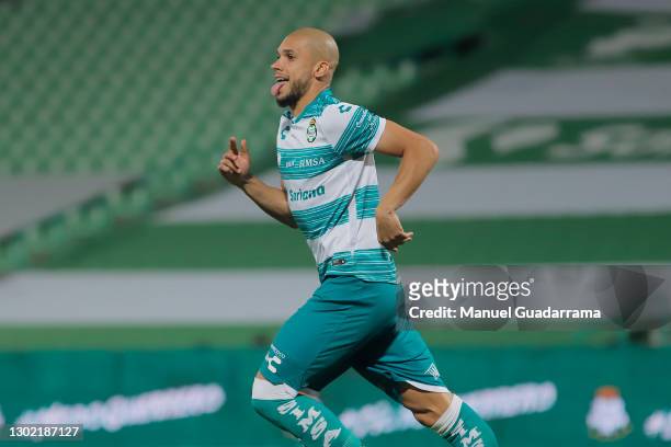 Matheus Doria of Santos celebrates after scoring the first goal of his team during a match between Santos Laguna and Monterrey as part of Torneo...