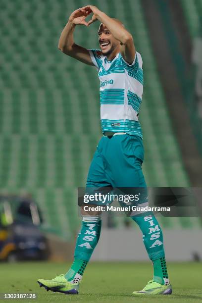 Matheus Doria of Santos celebrates after scoring the first goal of his team during a match between Santos Laguna and Monterrey as part of Torneo...