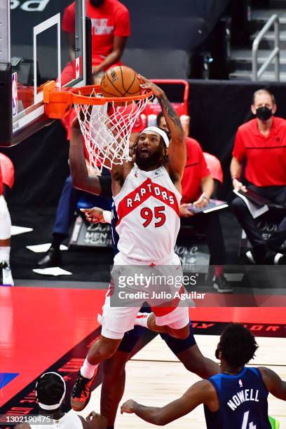 DeAndre' Bembry of the Toronto Raptors dunks the ball during the first half against the Minnesota Timberwolves at Amalie Arena on February 14, 2021...