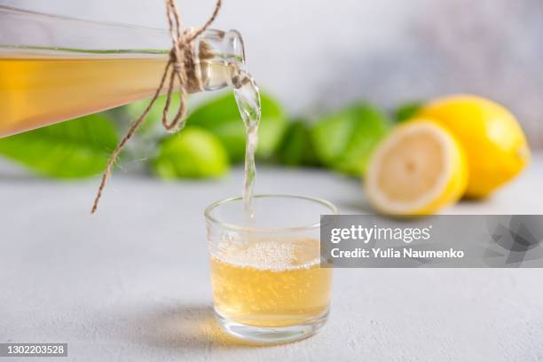 homemade kombucha tea - ginger glasses stock pictures, royalty-free photos & images