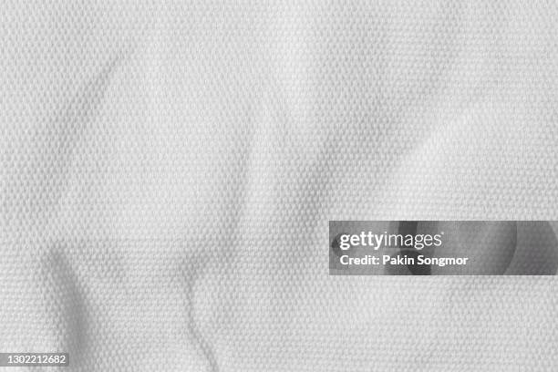 white fabric cloth polyester texture, textile background. - jersey top stockfoto's en -beelden