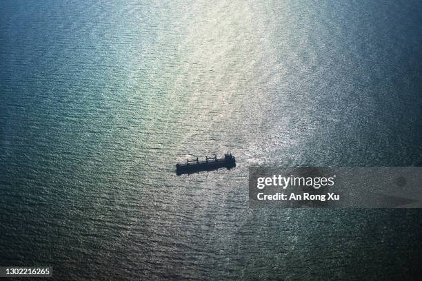 Freight vessels are seen in the waters of the South China Sea between the city of Xiamen in China and the island of Kinmen in Taiwan on February 02,...