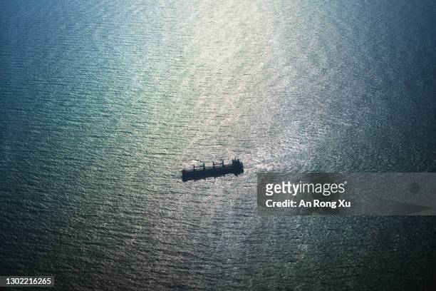Freight vessels are seen in the waters of the South China Sea between the city of Xiamen in China and the island of Kinmen in Taiwan on February 02,...