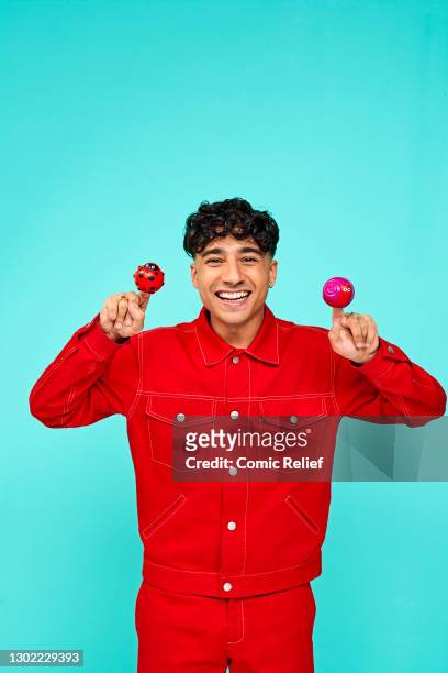 Television presenter, Karim Zeroual holding Red Nose Day 2021 noses on October 23,2020 in London, England. Red Nose Day takes place on March 19th...