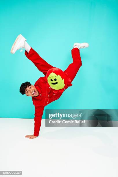 Television presenter, Karim Zeroual holding Red Nose Day 2021 merchandise on October 23,2020 in London, England. Red Nose Day takes place on March...