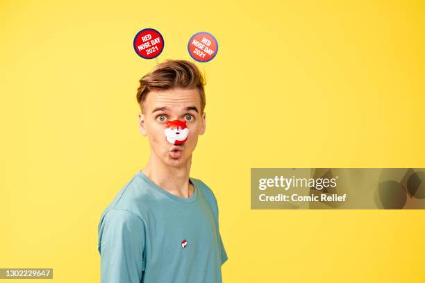 2nd 2020: Youtuber, Joe Sugg wearing a Red Nose Day 2021 nose and deeley boppers on November 2,2020 in London, England. Red Nose Day takes place on...