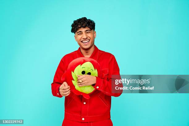 Television presenter, Karim Zeroual holding Red Nose Day 2021 merchandise on October 23,2020 in London, England. Red Nose Day takes place on March...