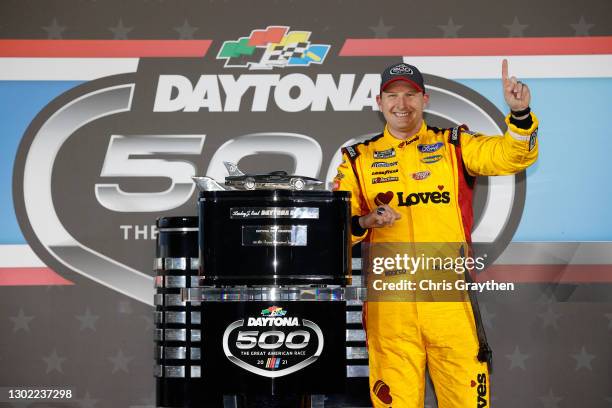 Michael McDowell, driver of the Love's Travel Stops Ford, celebrates in victory lane after winning the NASCAR Cup Series 63rd Annual Daytona 500 at...