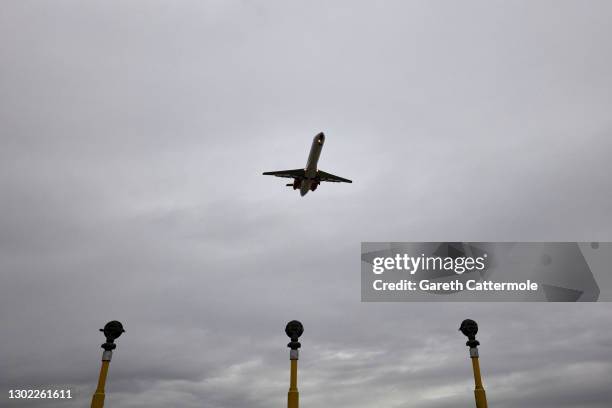 An aircraft lands at Stansted Airport on February 14, 2021 in Stansted, United Kingdom.