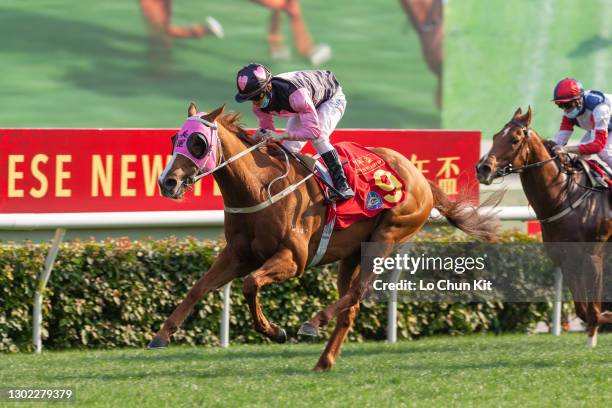 Jockey Matthew Chadwick riding Beauty Smile wins the Race 8 Chinese New Year Cup at Sha Tin Racecourse on February 14, 2021 in Hong Kong.