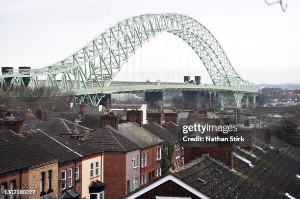 General view of The Silver Jubilee Bridge which crosses the River Mersey between Runcorn and Widnes on February 15, 2021 in Runcorn,England .