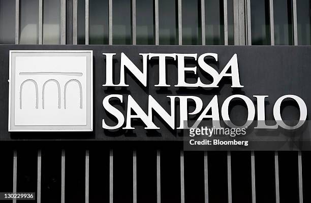 Sign sits outside an Intesa Sanpaolo SpA bank branch in Rome, Italy, on Monday, Oct. 24, 2011. Italian President Giorgio Napolitano said the nation...