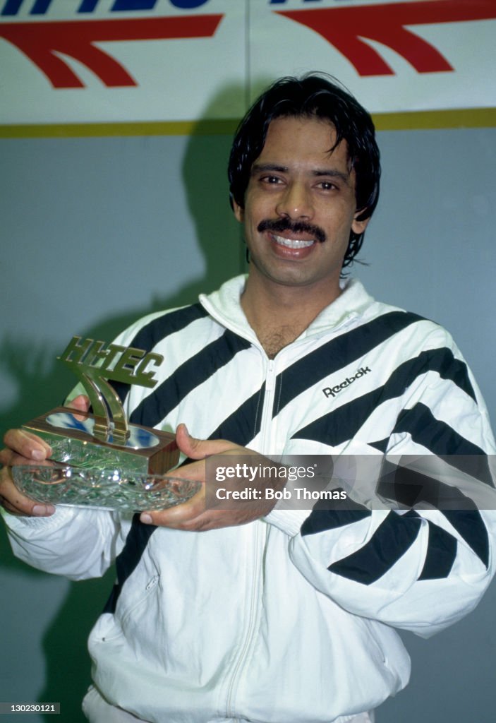 Jahangir Khan Of Pakistan With His Trophy After Becoming The Men s jahangir-khan-of-pakistan-with-his-trophy-after-becoming-the-men-s