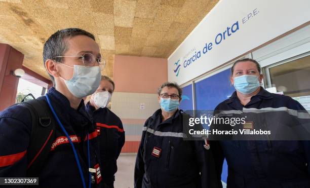 Members of a French medical team nurses Sandra Fleury, Sandrine Caumont and Isabelle Kulyk, and medical doctor Bérengèr Nion, wait for the arrival of...