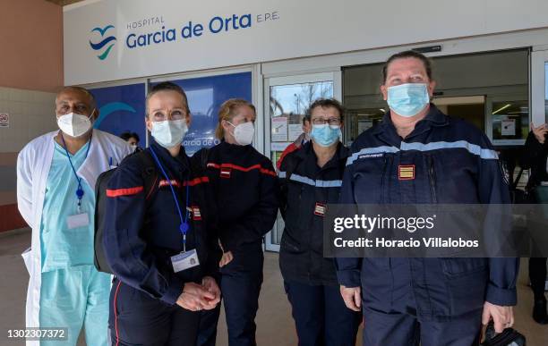 The ‎Intensive Care Service and Emergency Department Director Dr. Antero Fernandes waits with Members of a French medical team, nurses Sandra Fleury,...