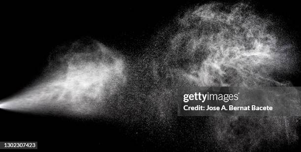 collision of two pressurized water jets on a black background. - 霧 個照片及圖片檔