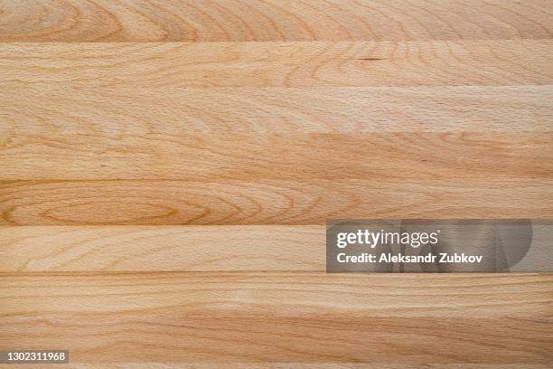 new wooden board, painted with protective paint. textured structural background. construction polished panel. - beech wood texture stock pictures, royalty-free photos & images