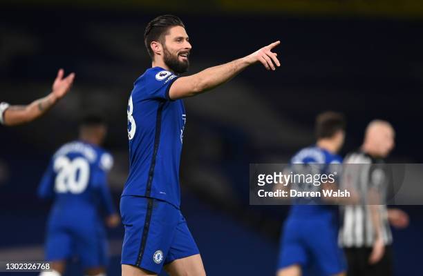 Olivier Giroud of Chelsea celebrates after scoring their team's first goal during the Premier League match between Chelsea and Newcastle United at...