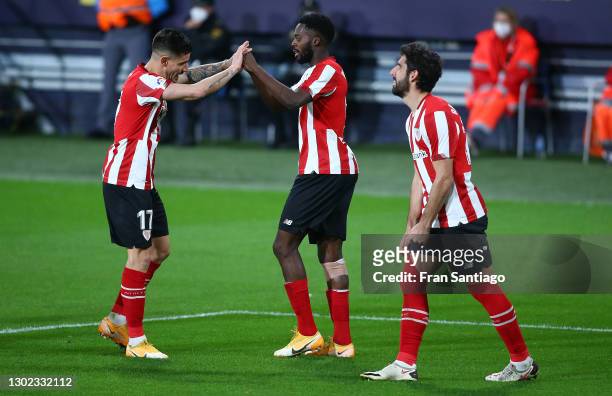 Inaki Williams of Athletic Bilbao celebrates with teammate Yuri Berchiche scoring their team's fourth goal during the La Liga Santander match between...