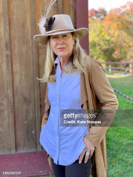 portrait of a woman in a cowboy hat - feather hat stock pictures, royalty-free photos & images