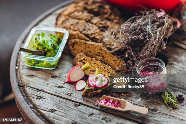 fresh wild garlic pesto with sourdough bread - garlic bread stock pictures, royalty-free photos & images