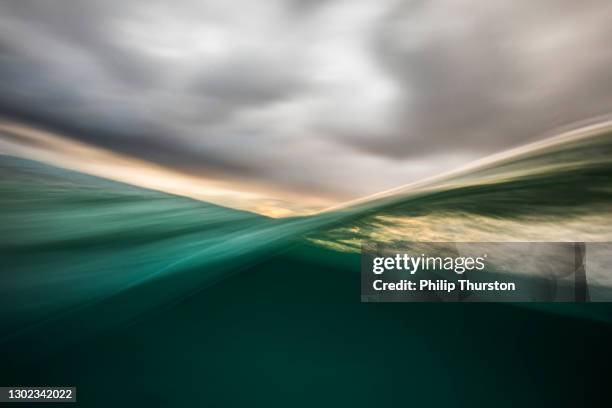 abstract background of flowing water surface - ocean surface level stock pictures, royalty-free photos & images