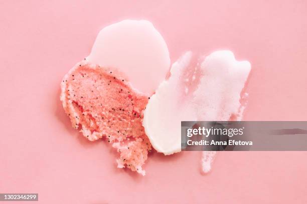 set of abstract smears of shower gel, cream and scrub on pink background. trendy products of the year. health and wellness concept - exfoliation stock pictures, royalty-free photos & images