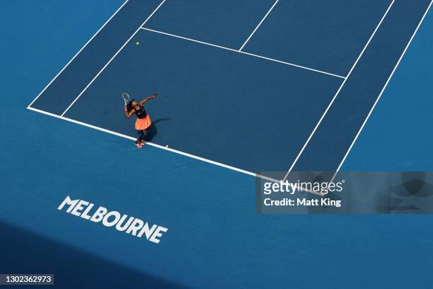 Naomi Osaka of Japan serves in her Women's Singles Quarterfinals match against Su-Wei Hsieh of Chinese Taipei during day nine of the 2021 Australian...