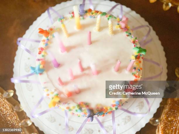 festive birthday cake with unlit candles - moments daily life from above imagens e fotografias de stock