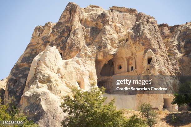 cave dwellings at goreme, cappadocia, turkey. - göreme stock pictures, royalty-free photos & images