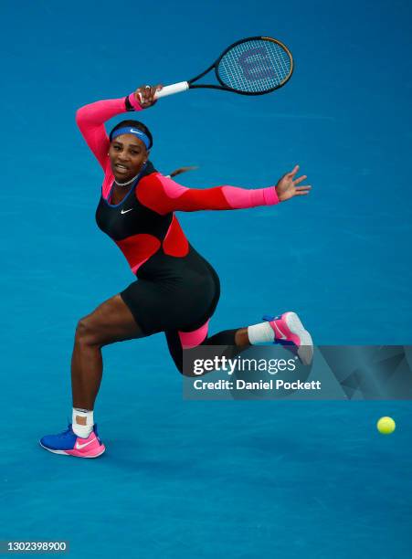 Serena Williams of the United States plays a forehand in her Women's Singles Quarterfinals match against Simona Halep of Romania during day nine of...