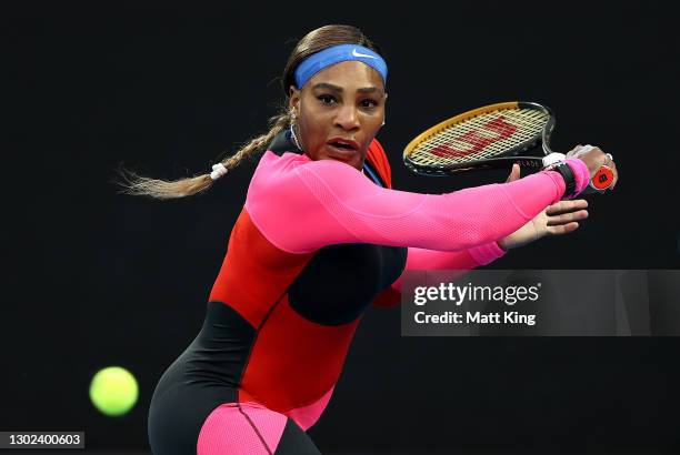 Serena Williams of the United States plays a backhand in her Women's Singles Quarterfinals match against Simona Halep of Romania during day nine of...