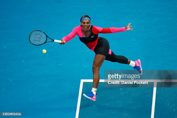 Serena Williams of the United States plays a forehand in her Women's Singles Quarterfinals match against Simona Halep of Romania during day nine of...