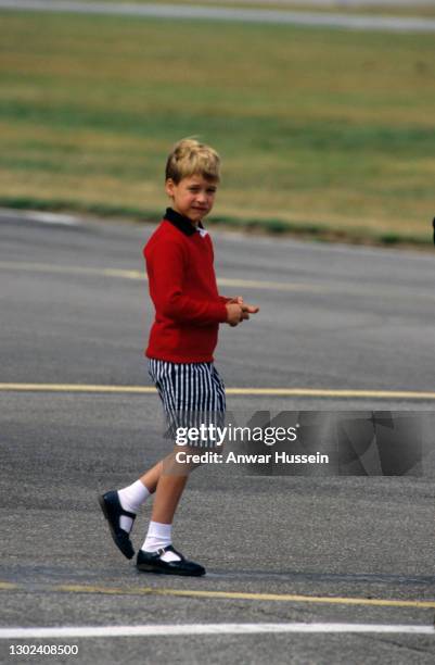 Prince William arrives at Aberdeen Airport for the start of his holidays in Scotland on August 14, 1989 in Aberdeen, Scotland.