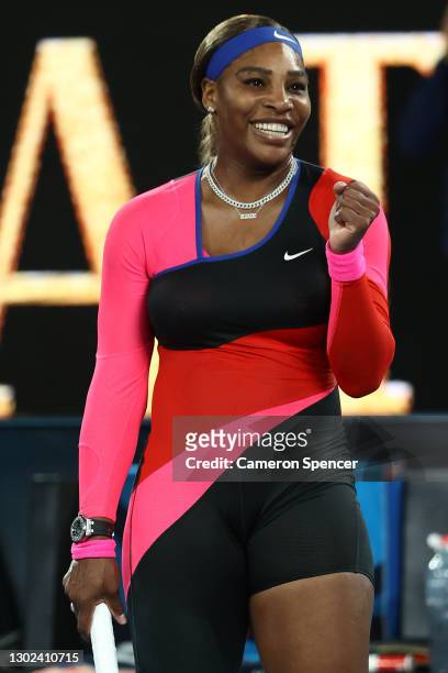 Serena Williams of the United States celebrates winning her Women's Singles Quarterfinals match against Simona Halep of Romania during day nine of...