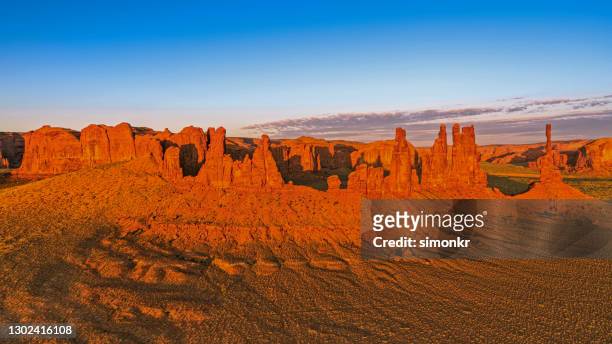 view of  monument valley - butte rocky outcrop stock pictures, royalty-free photos & images