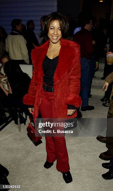 Delilah Cotto poses for photographers at the Chrysler Million Dollar Film Festival Party at the Chrysler Lodge.