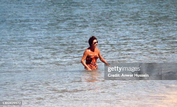 Princess Margaret enjoys a swim in the sea while on holiday in the island of Mustique in1976 in Mustique. .