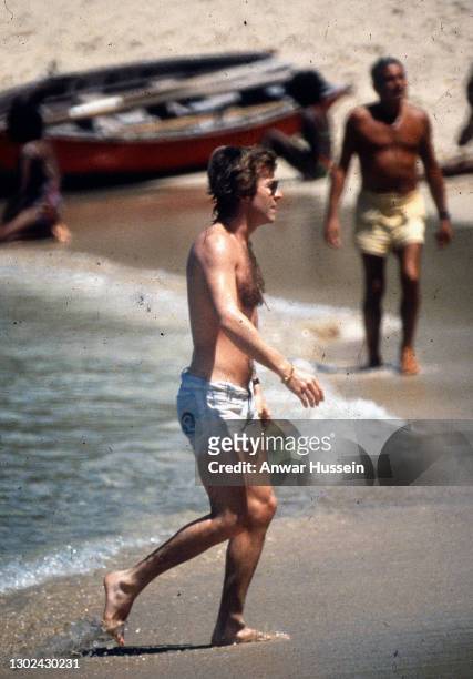 Roddy Llewellyn, Princess Margaret's boyfriend, goes a swim in the sea while on holiday in the island of Mustique in 1976 in Mustique. .