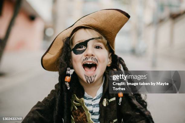 boy dressed up as a pirate yelling - pirate kids ストックフォトと画像