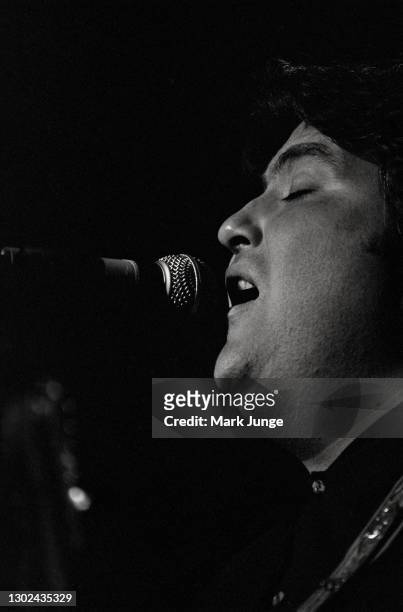David Hidalgo sings in a Los Lobos concert at the Paramount Theatre on November 5, 1987 in Denver, Colorado. Los Lobos is an American rock band...
