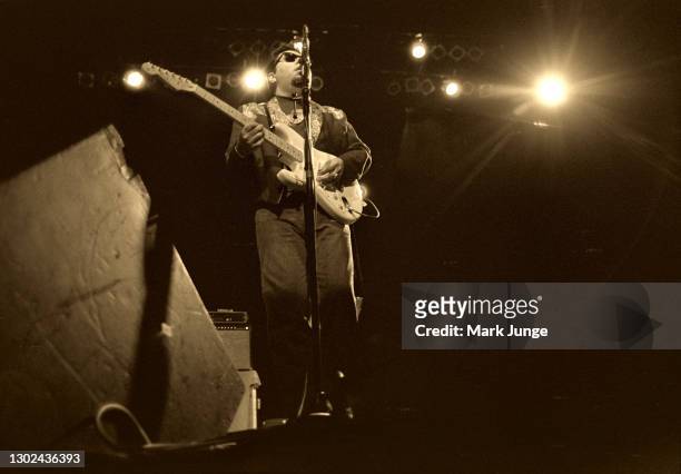 Cesar Rosas plays the guitar and sings in a Los Lobos concert at the Paramount Theatre on November 5, 1987 in Denver, Colorado. Los Lobos is an...
