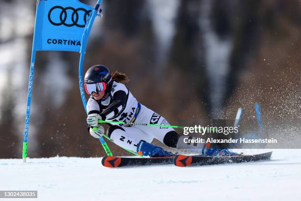 Piera Hudson of New Zealand competes in Women's Parallel Giant Slalom against Tina Robnik of Slovenia in the FIS World Ski Championships Women's...