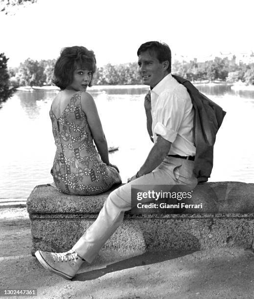 Spanish actress Maria Silva and French actor Gil Vidal during the filming of "Los Novios" in the lake of "Parque del Retiro", Madrid, Spain, 1966.